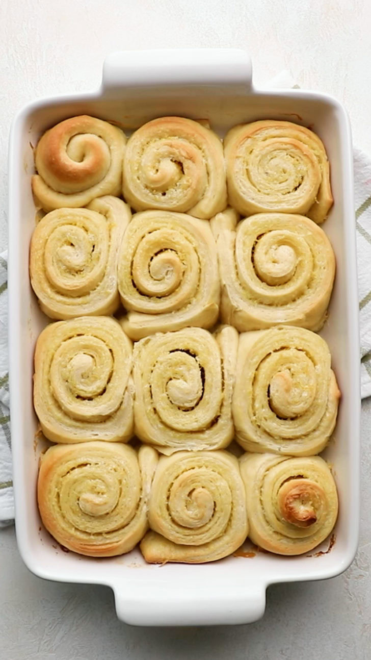 Baked lemon sweet rolls in casserole dish.