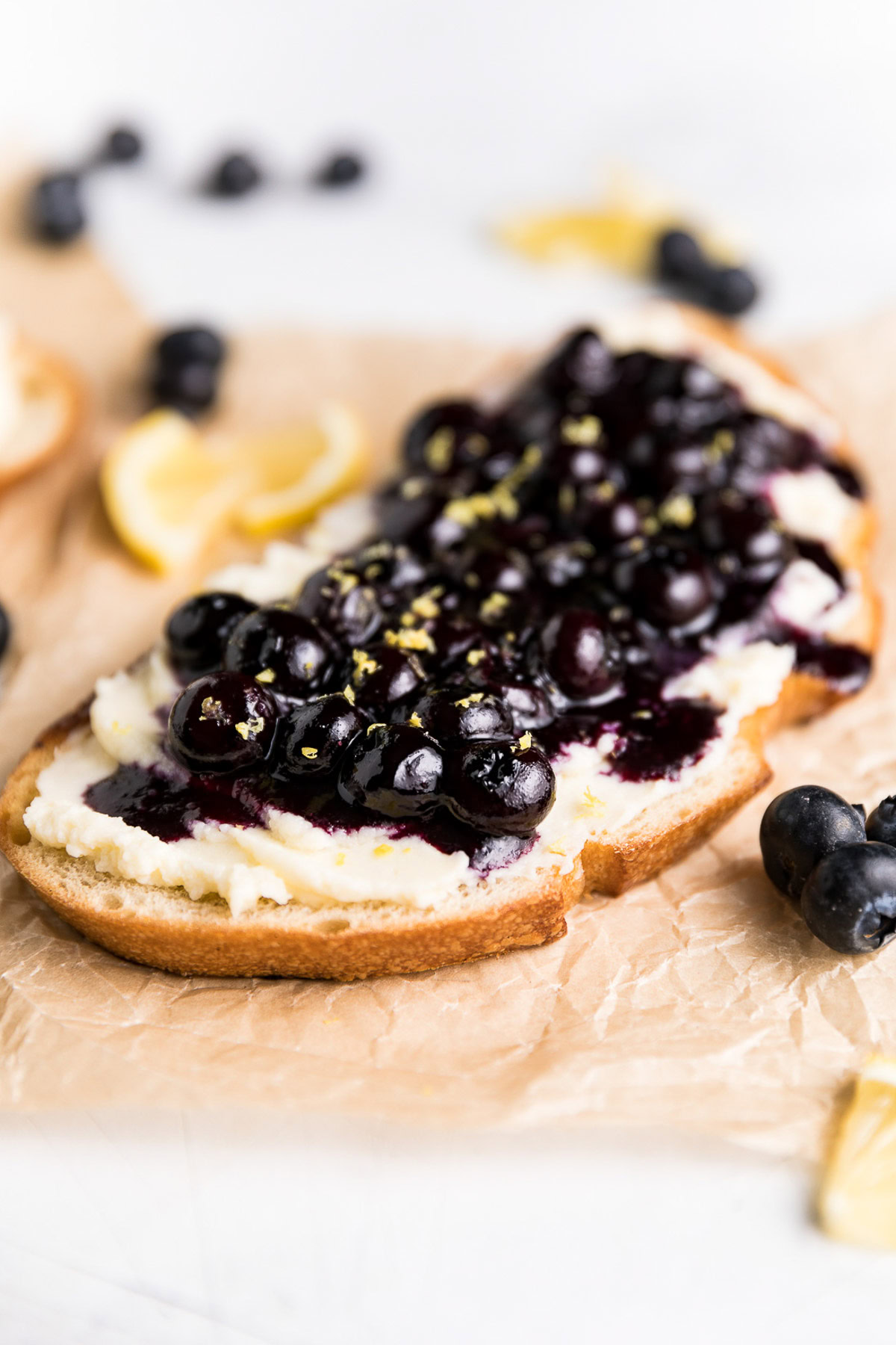 Blueberry toast with lemon zest and fresh blueberries.