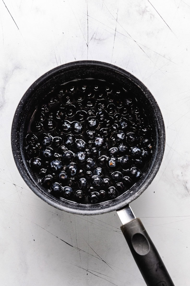 Blueberries added to simple syrup.