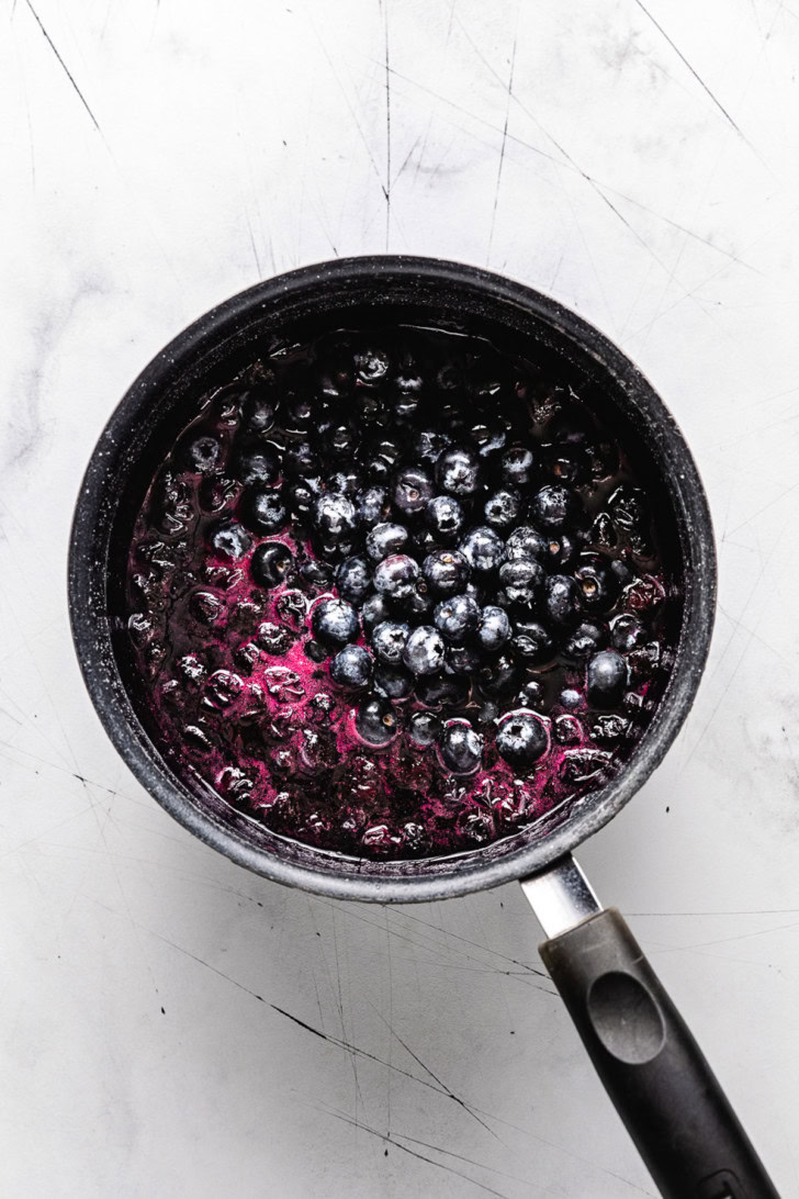 Blueberries simmering in syrup.