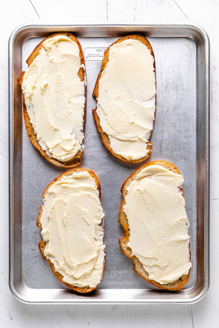 Toast slices spread with mascarpone.