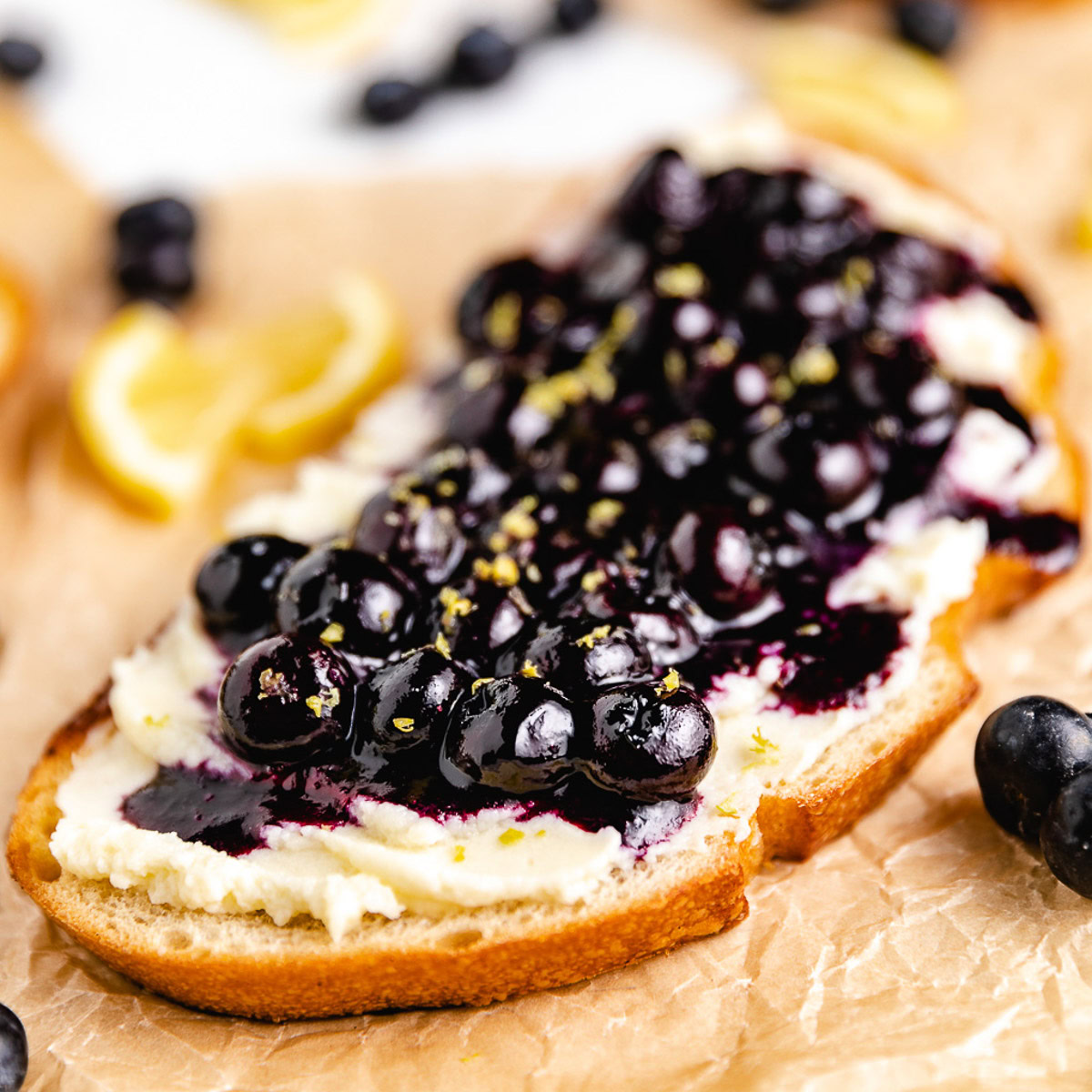 Close-up of blueberry toast with lemon zest.