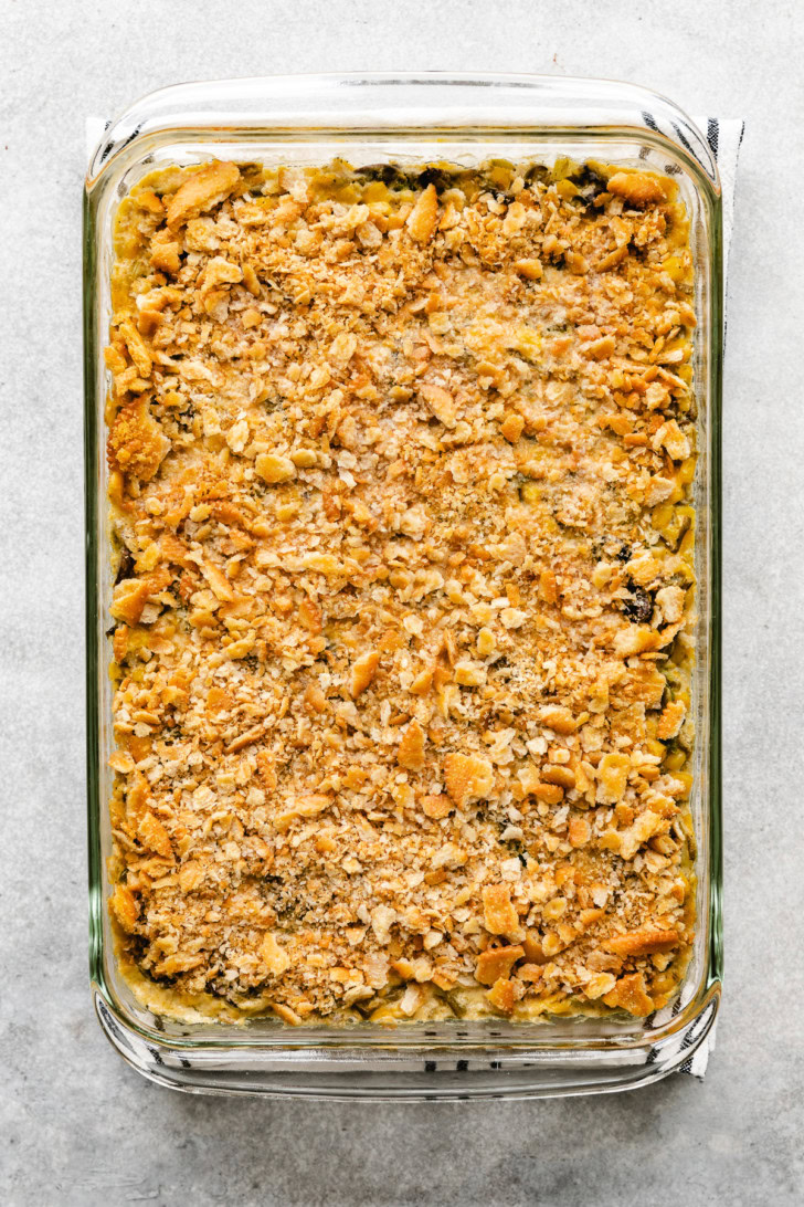 Overhead view of green bean and corn casserole in a baking dish.