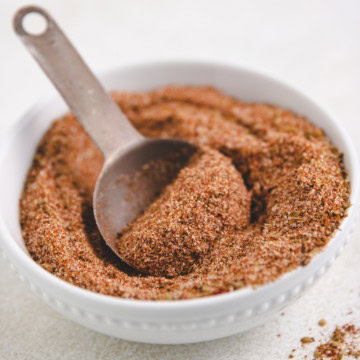 Close up view of a bowl of taco seasoning.