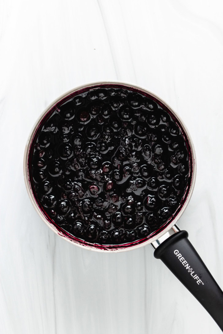 Blueberry compote in a saucepan.