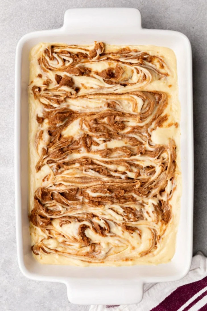 Cinnamon sugar swirled into cake batter.