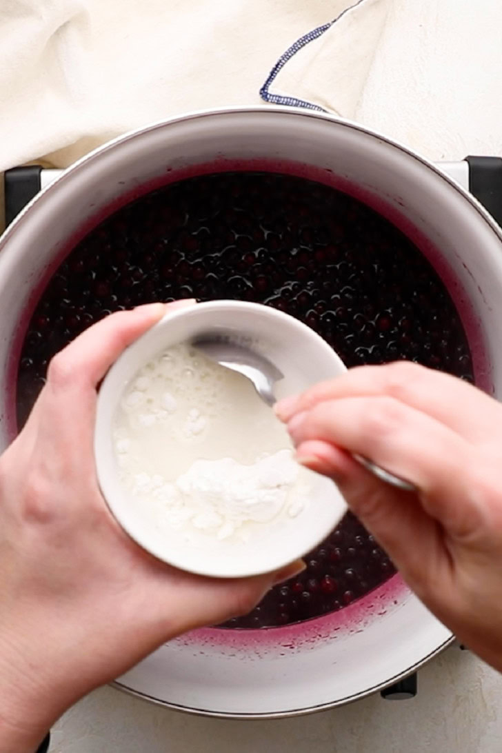 Cornstarch slurry for thickening blueberry pie filling.