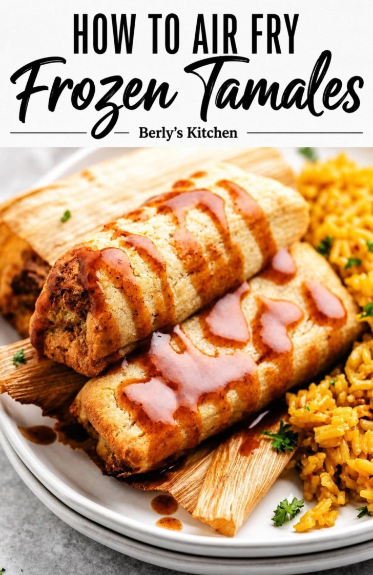 Pile of tamales with taco sauce on a stack of plates.