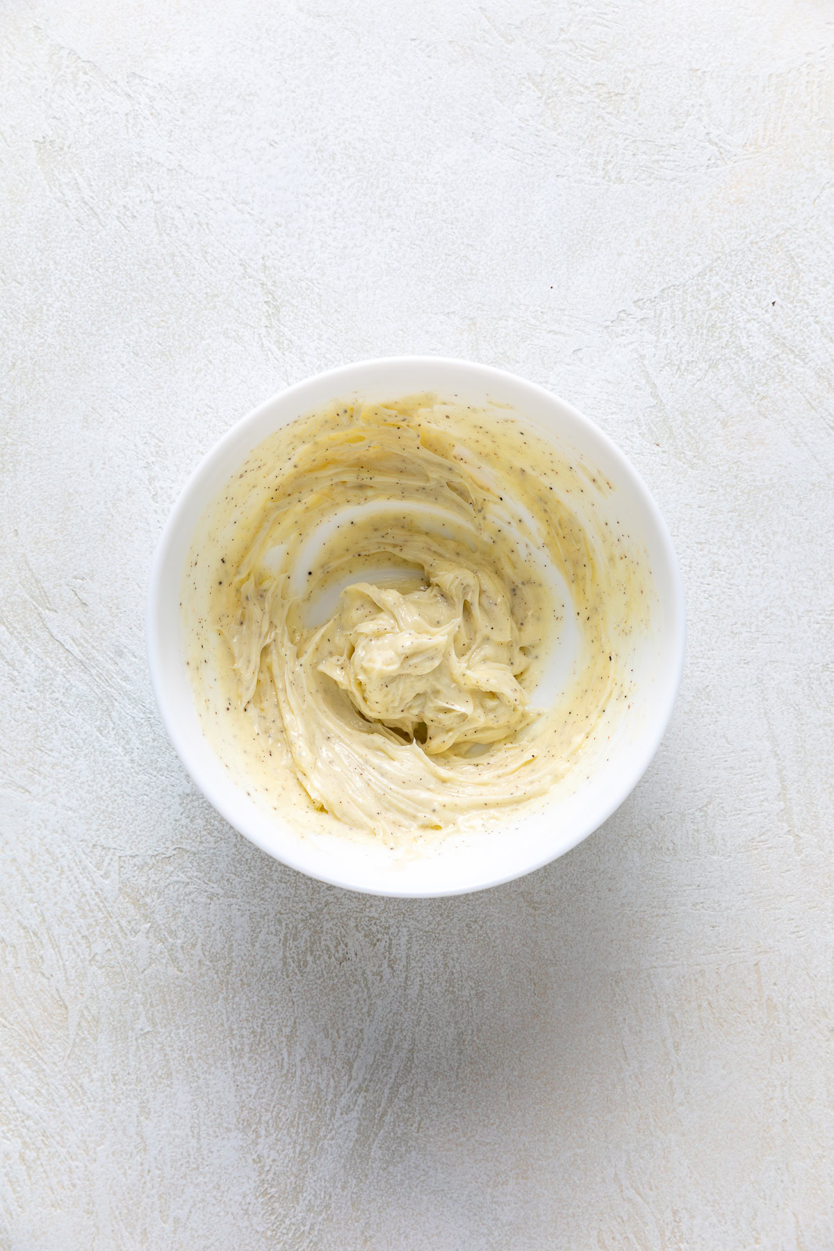Seasoned butter mixed with salt and black pepper.