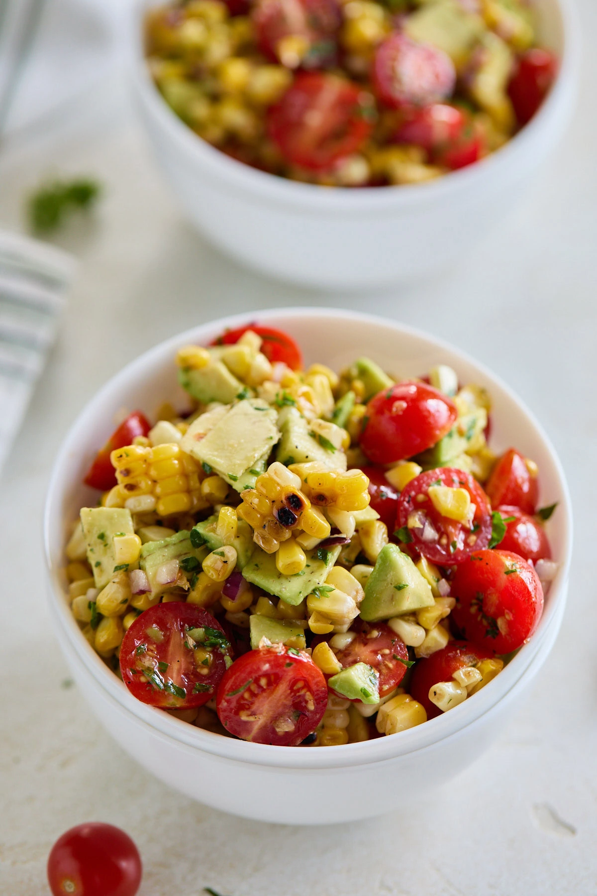 Summer tomato and corn salad tossed in a lime dressing.