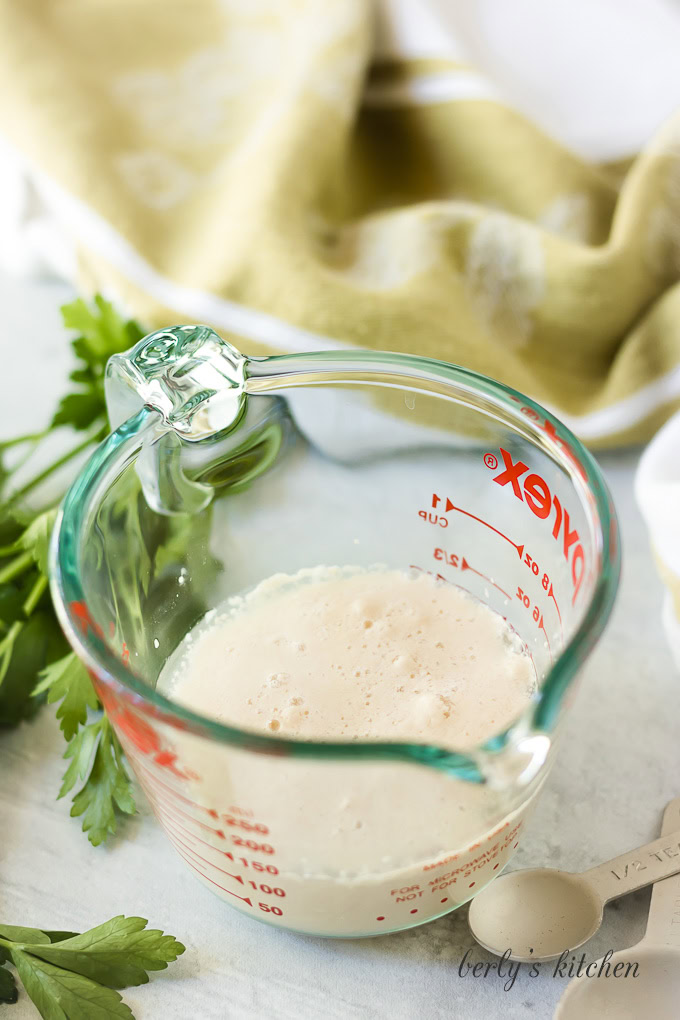 Yeast activating in a measuring cup.