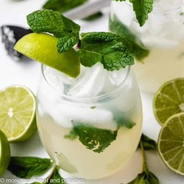 Virgin mojito with fresh mint, lime, and ice served in a short glass.
