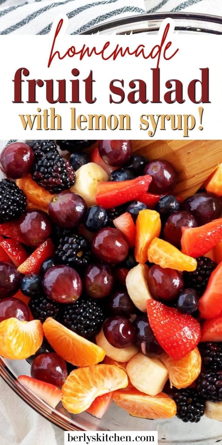 Close up view of a bowl of homemade fruit salad with lemon syrup.