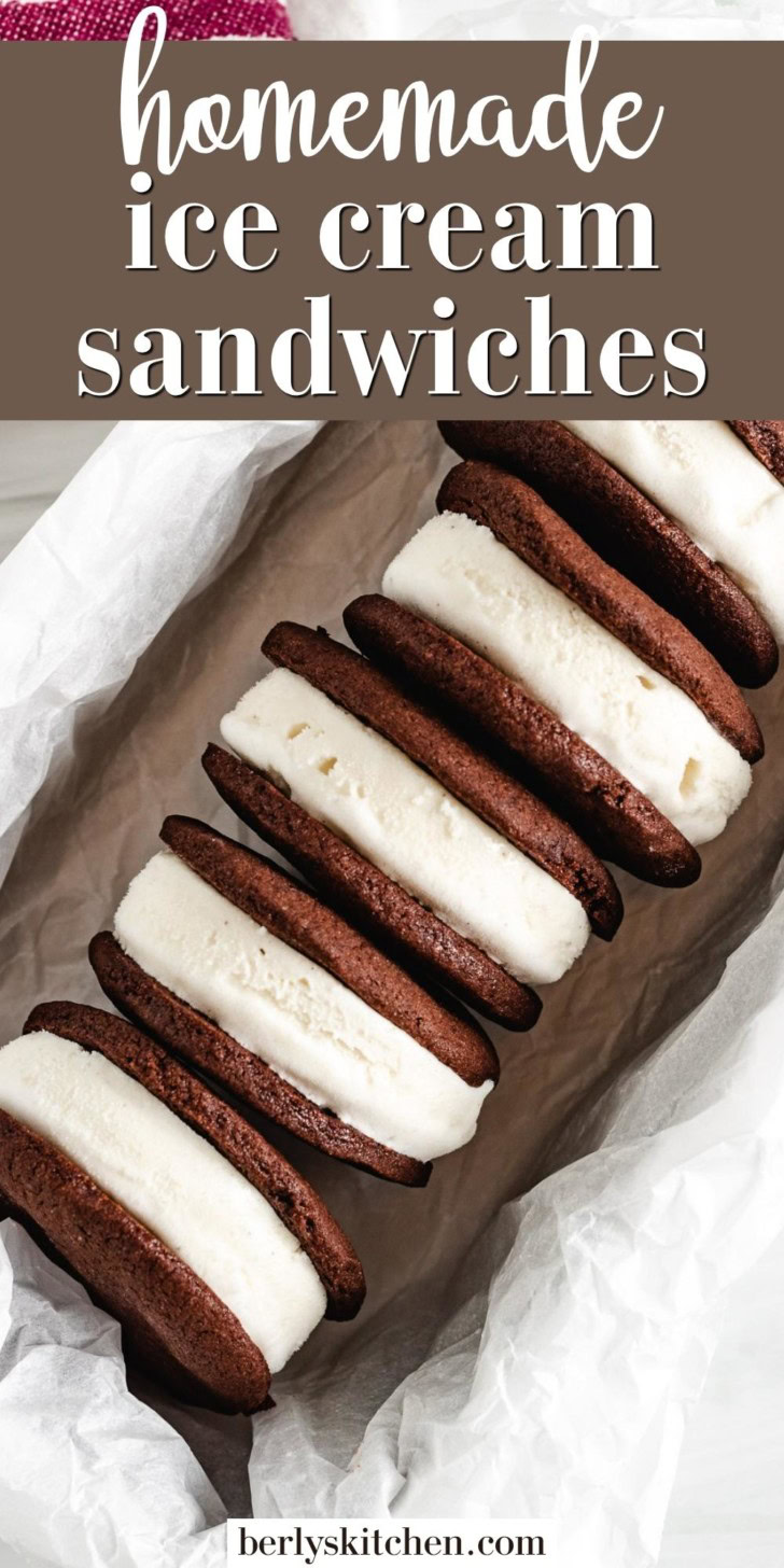 Overhead view of ice cream sandwiches in a parchment lined pan.