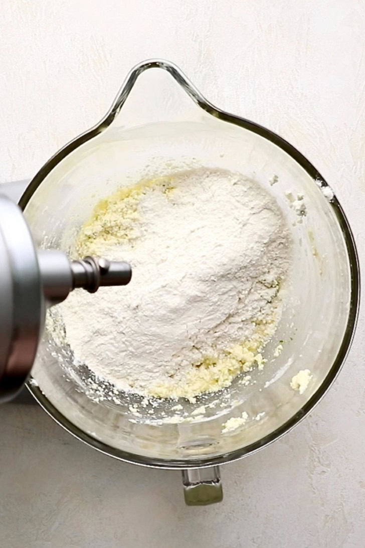 Flour added to key lime pound cake batter.