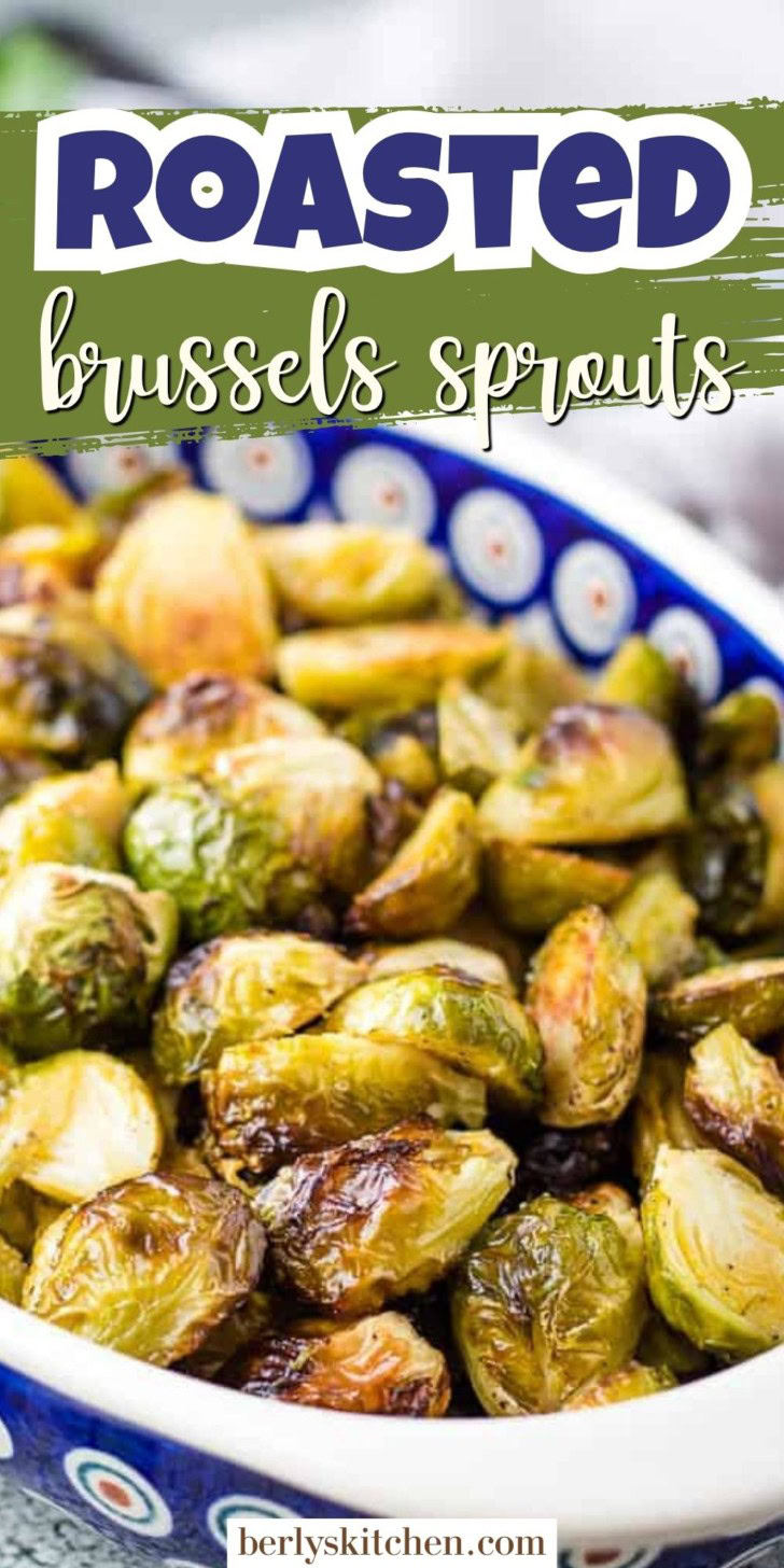 Roasted brussels sprouts in a blue and white dish.