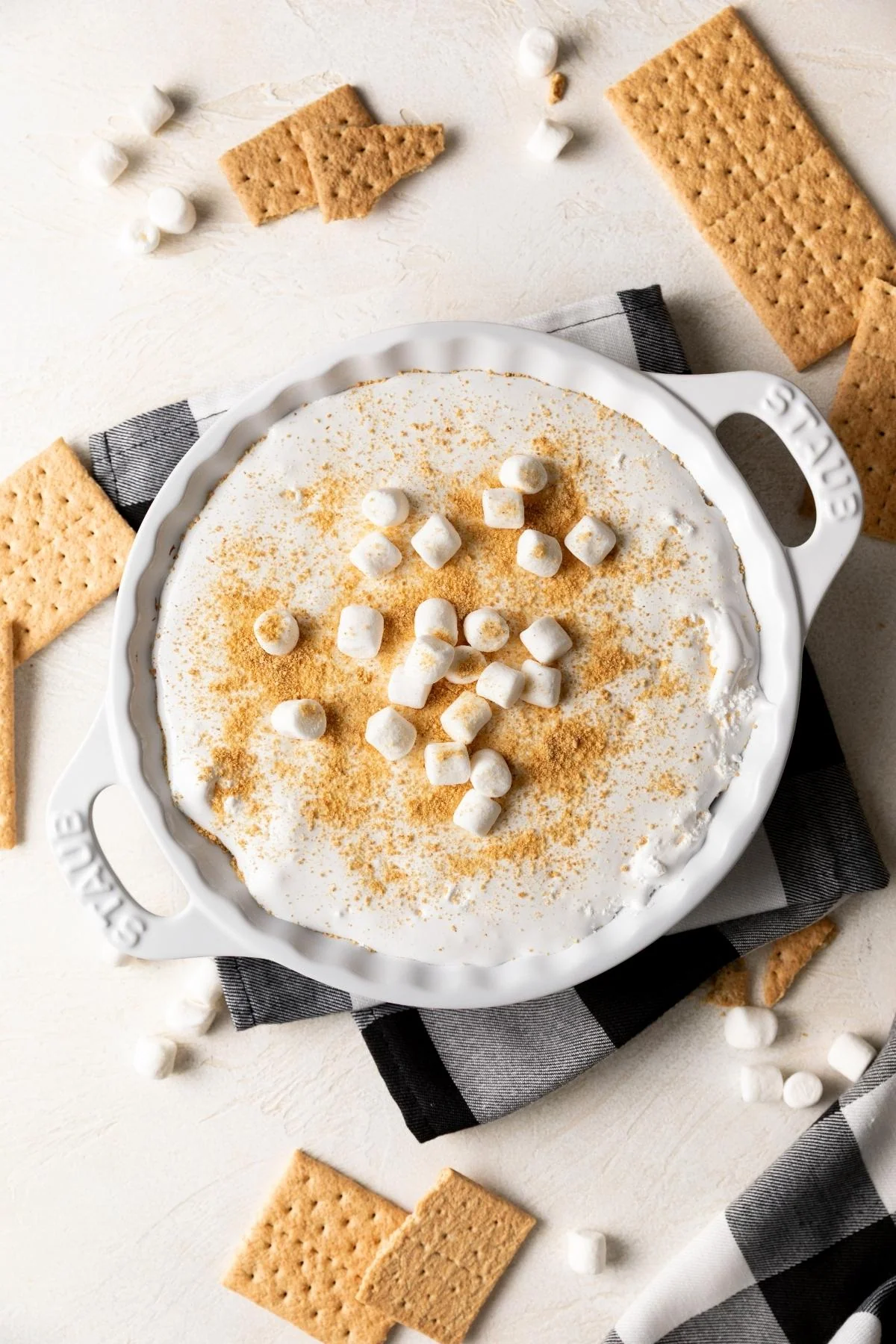 Overhead view of s’mores dip with graham crackers.