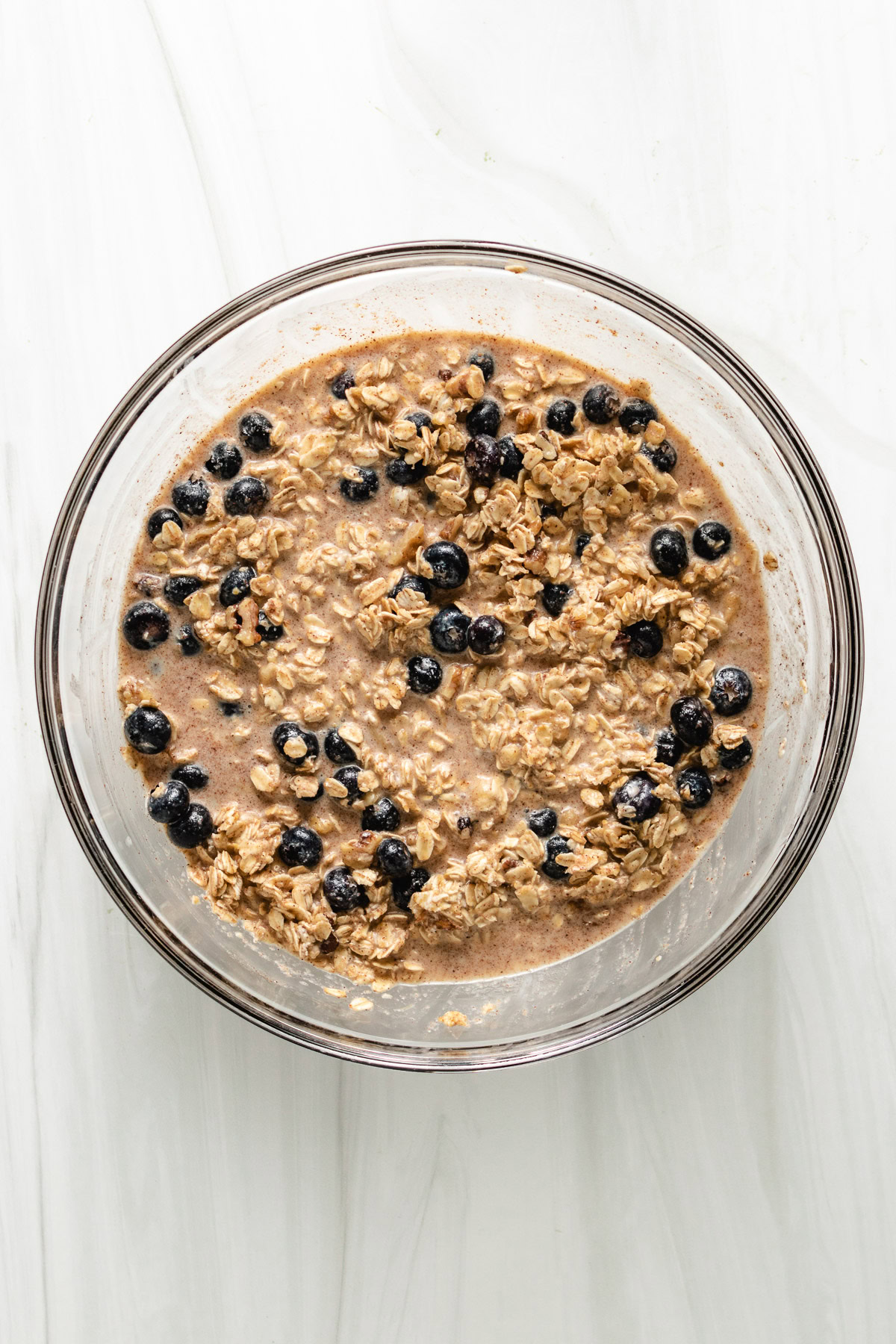Blueberries mixed into oatmeal mixture.