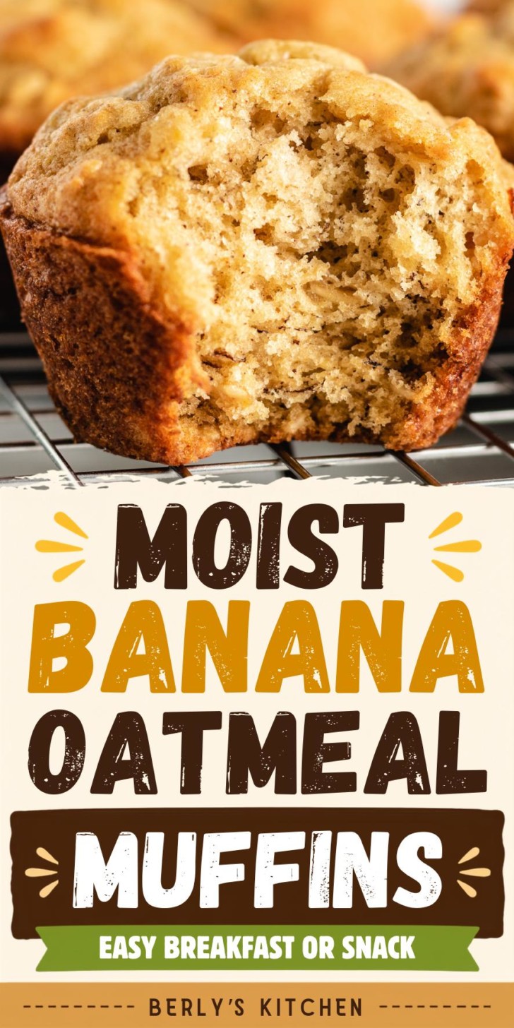 Bite taken out of a freshly baked banana oat muffin.