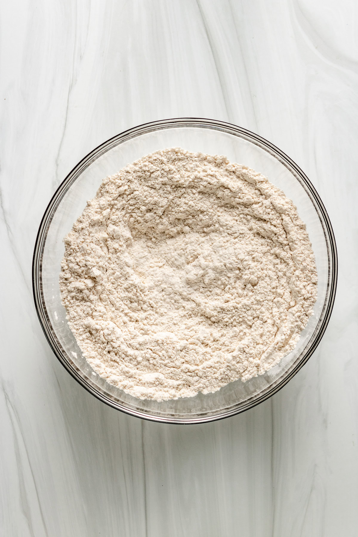 Seasoned flour in a mixing bowl.