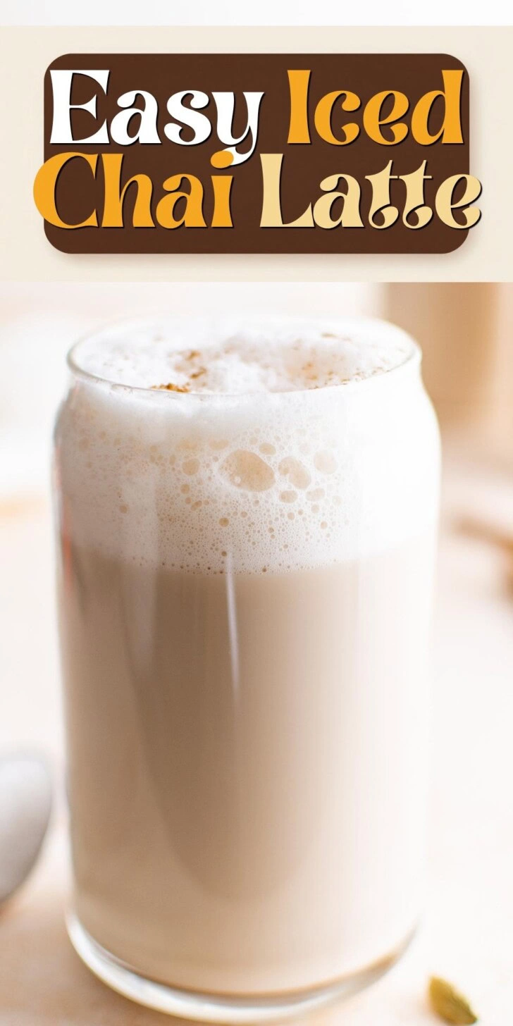 Refreshing iced chai latte with frothy milk and spices.