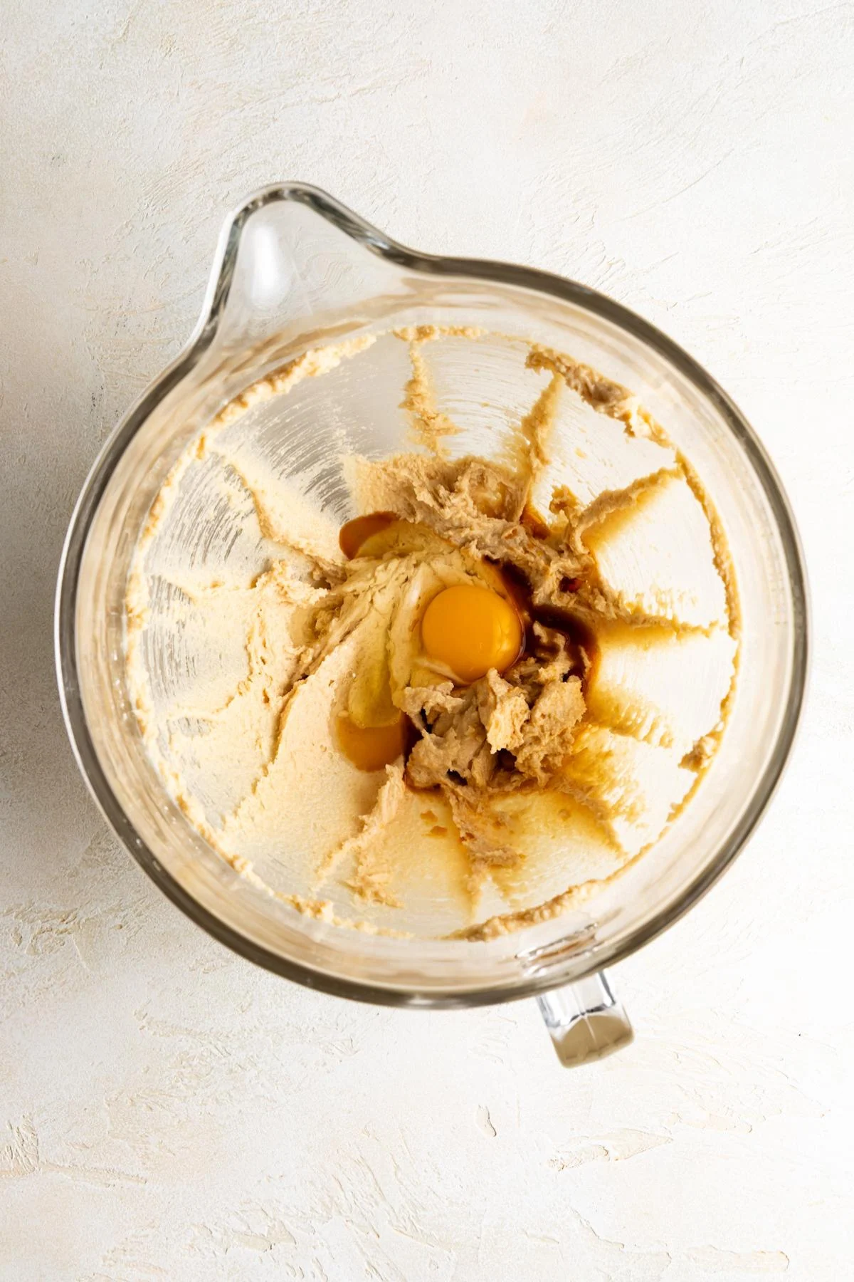 Egg and vanilla added to butter and sugar mixture.
