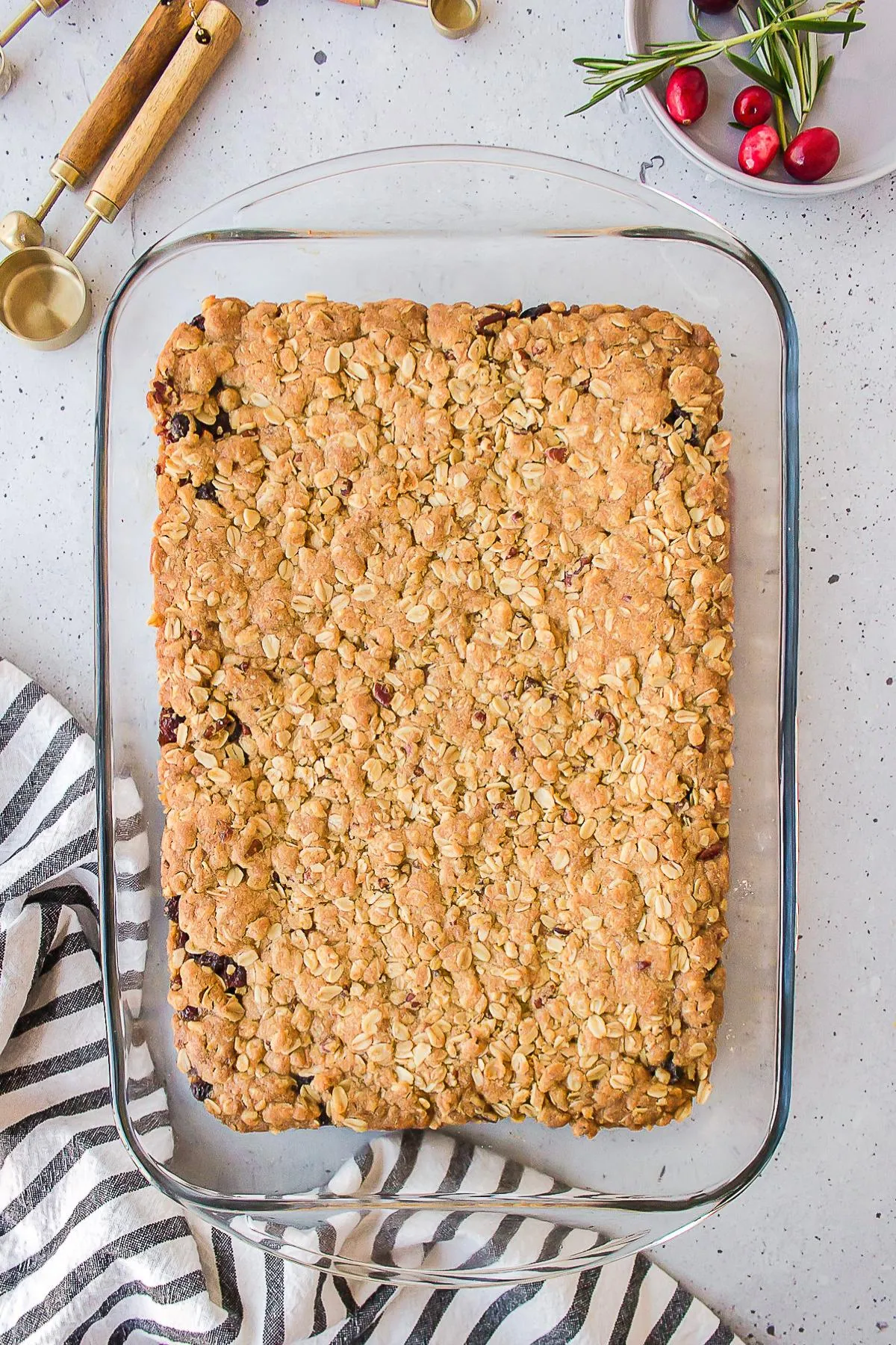 Cranberry oat bars baked in a pan.