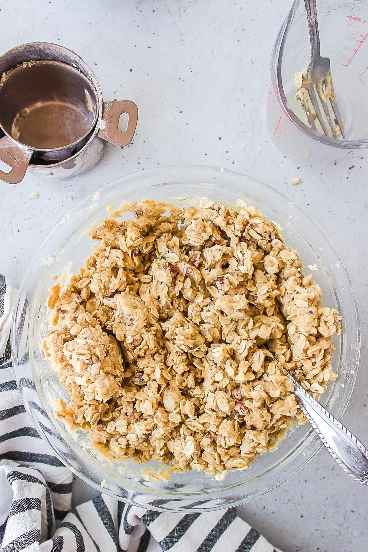 Oatmeal crumble mixed in a bowl..