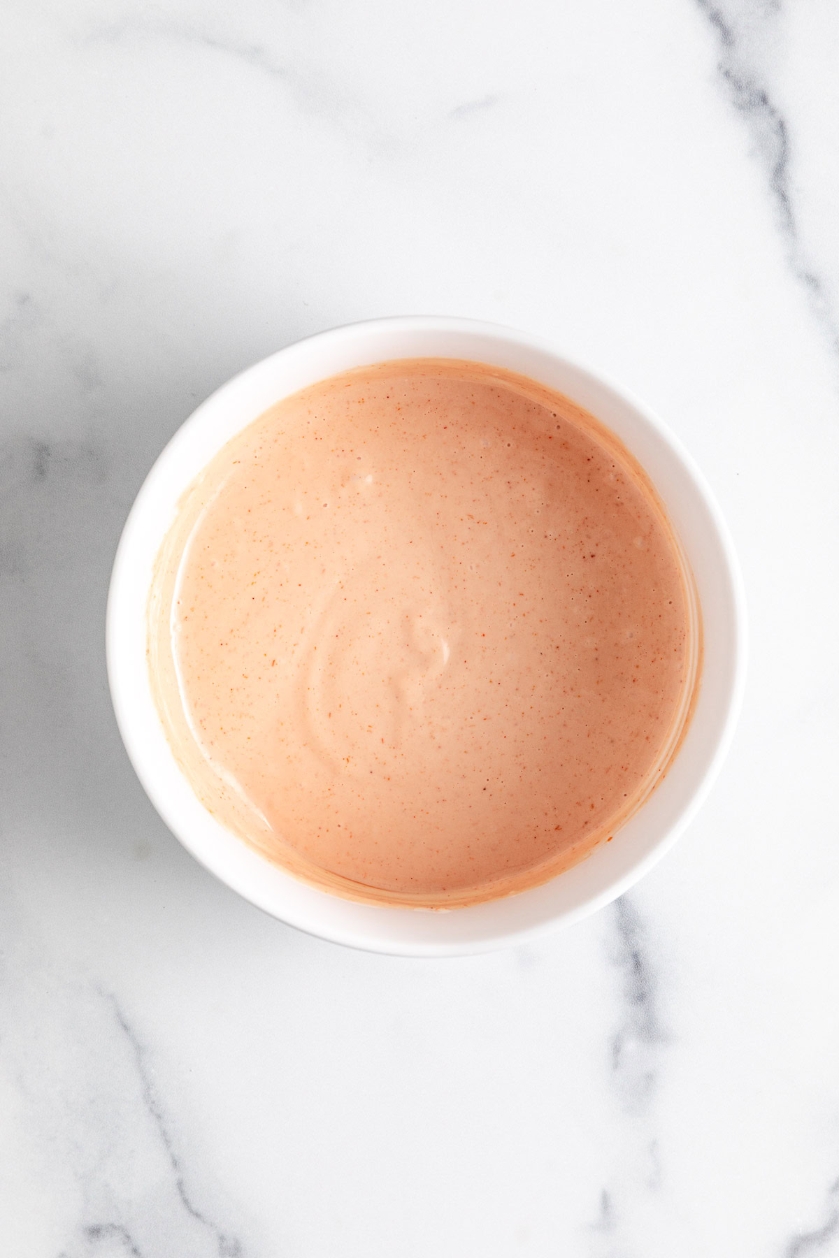 Overhead view of Utah fry sauce in a white bowl.