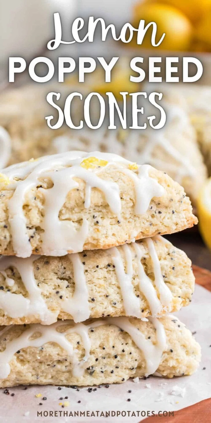 Lemon poppy seed scones stacked on parchment.
