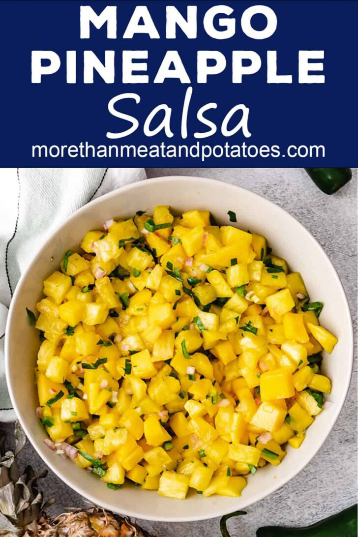 Overhead view of a bowl of mango pineapple salsa.