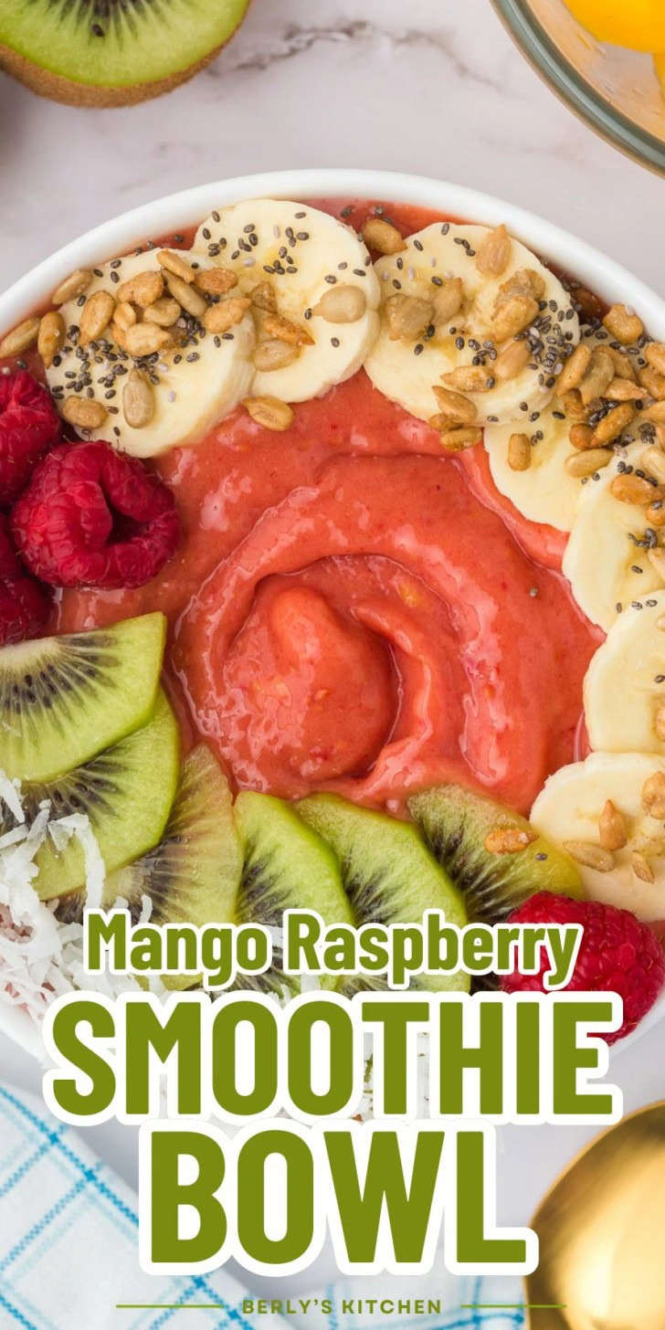 Oversized photo of a mango raspberry smoothie bowl.