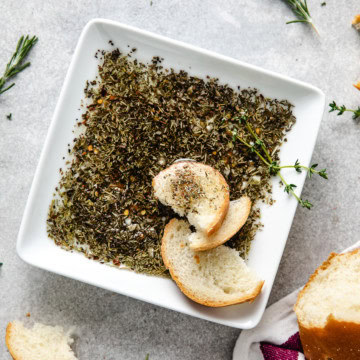Overhead view of Olive Oil and Balsamic Vinegar Bread Dip on plate.