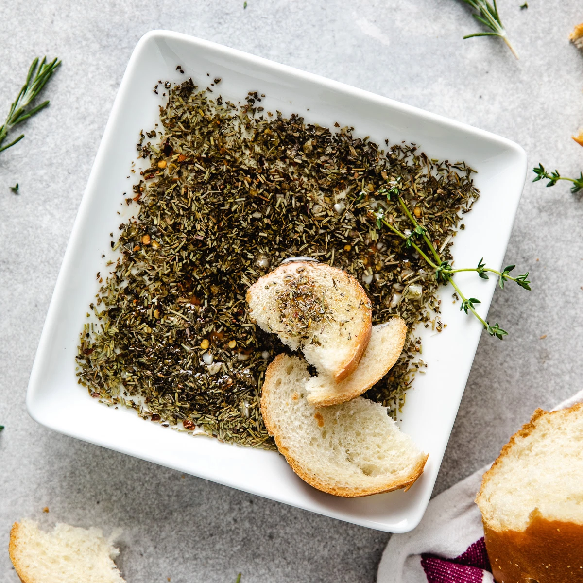 Overhead view of Olive Oil and Balsamic Vinegar Bread Dip on plate.