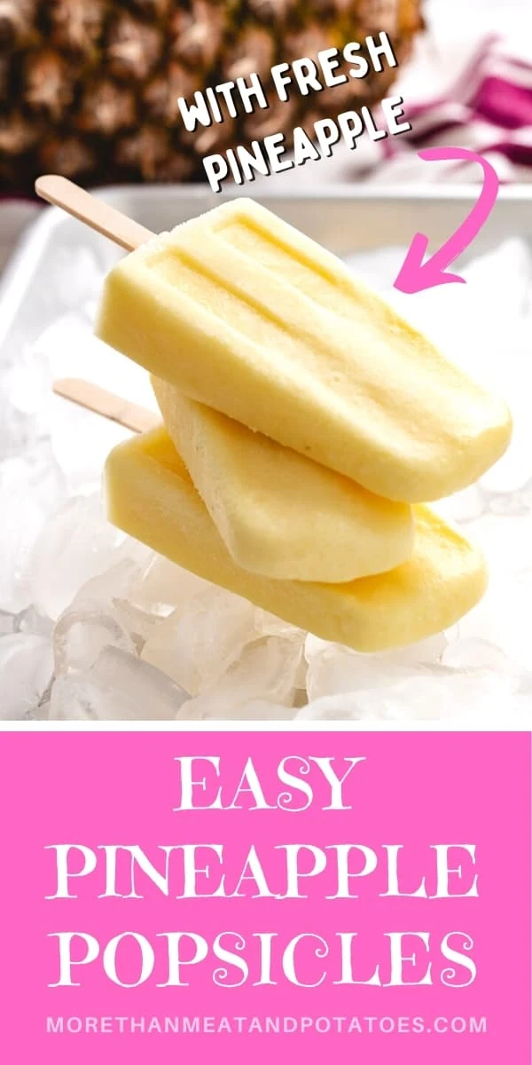 Stack of pineapple popsicles on a sheet pan.