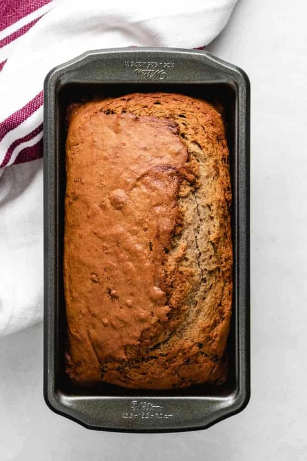 Sourdough banana bread in a loaf pan.