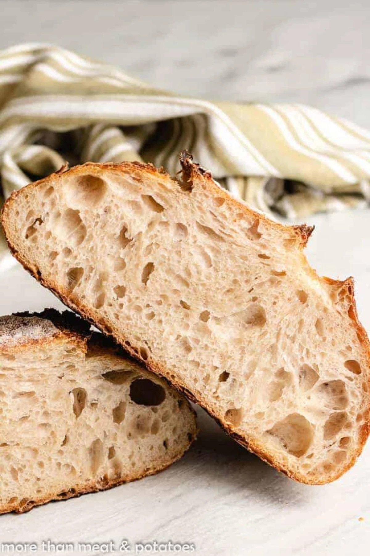Sourdough loaf sliced in half.