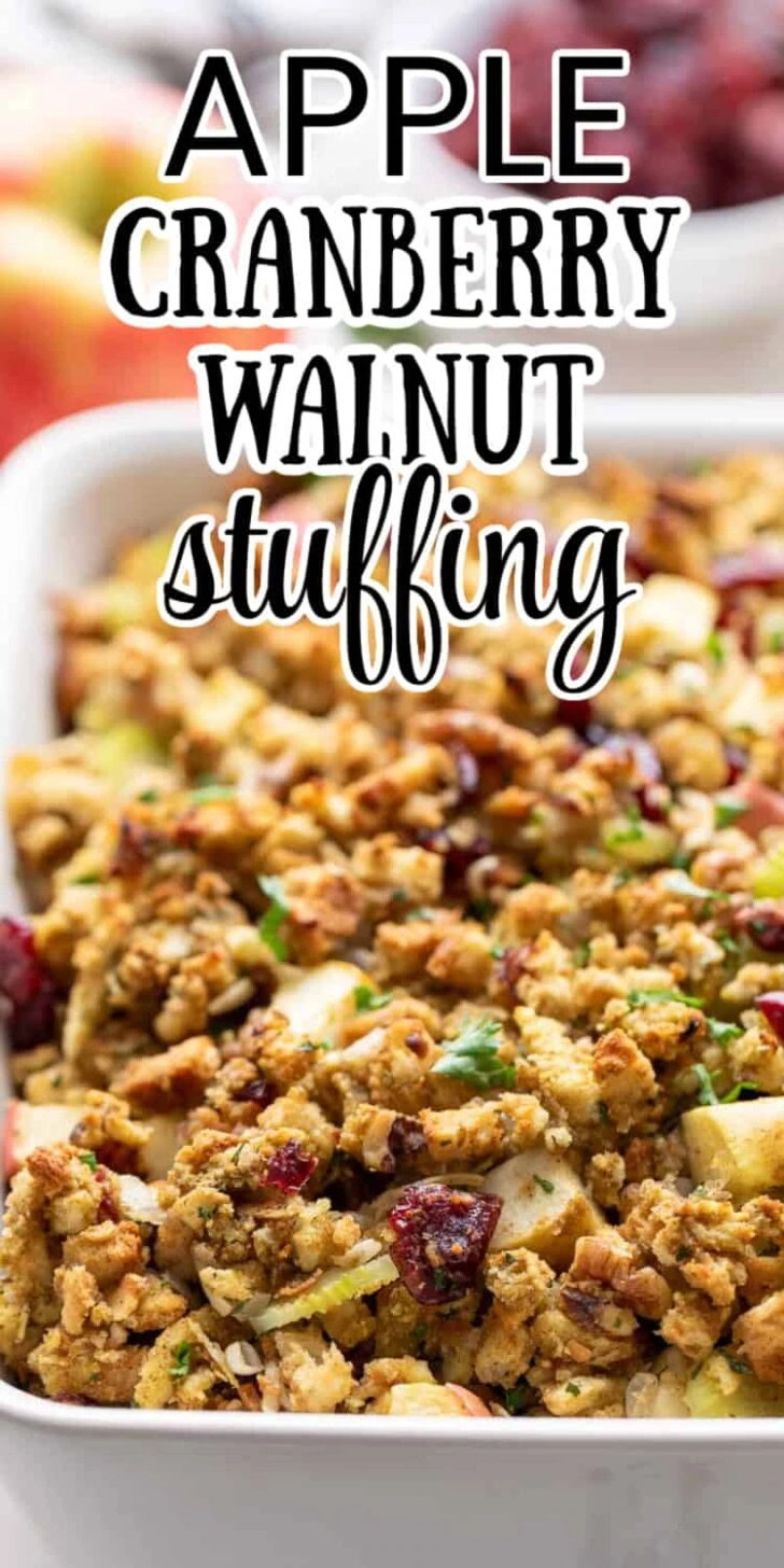 Close up view of cranberry apple stuffing in a white dish.