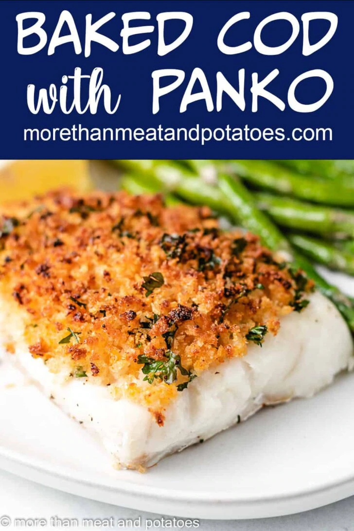 Close up view of a fillet of baked cod topped with panko.