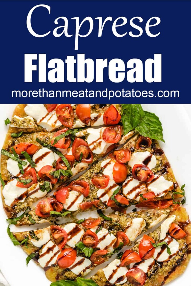 Basil pesto caprese flatbread on a plate.