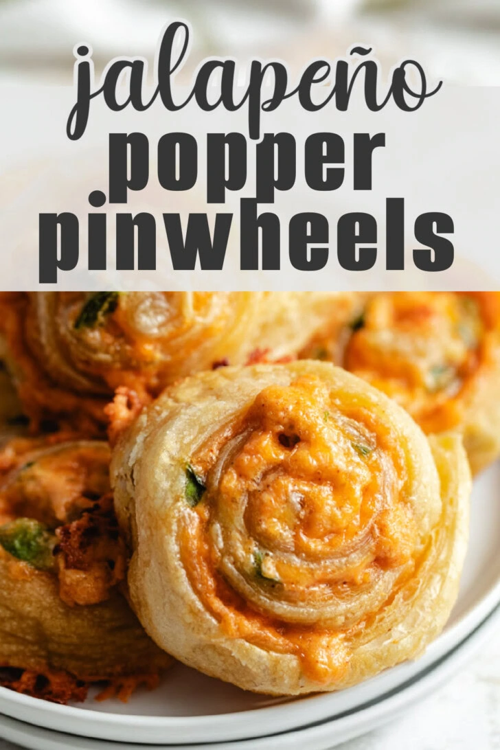 Puff pastry jalapeno popper pinwheels on a plate.