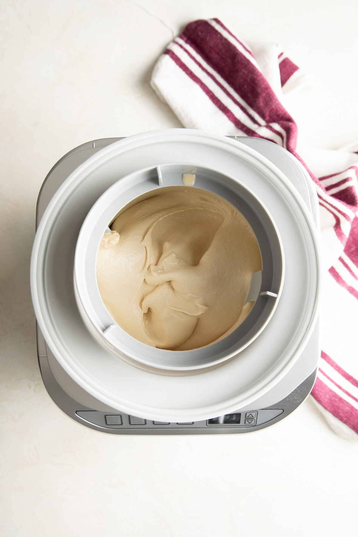 Overhead view of kahlua ice cream in an ice cream machine.