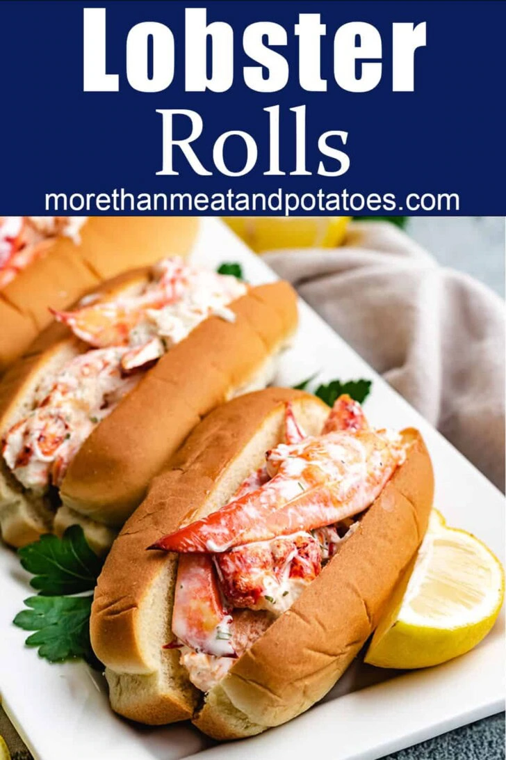 Homemade lobster rolls on a platter.