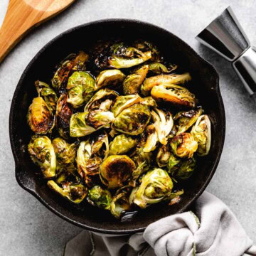 Overhead view of maple bourbon brussels sprouts in a pan.