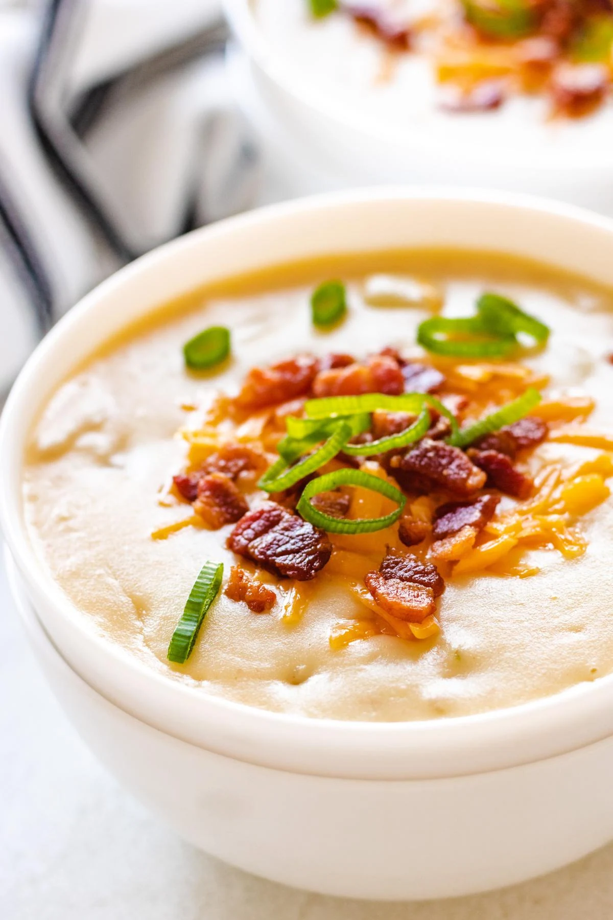 Cheesy potato soup with bacon and green onions.