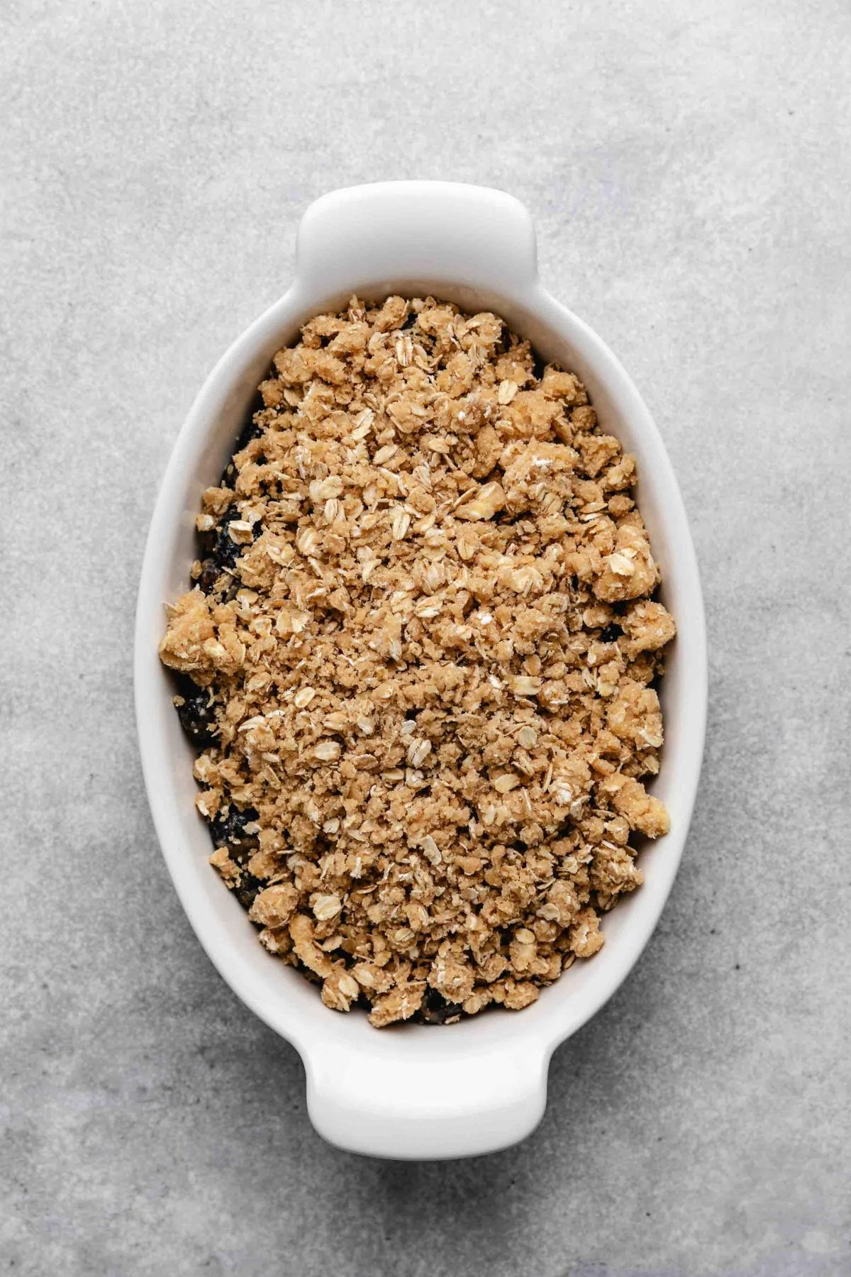 Blueberry filling covered with oat crumble topping.