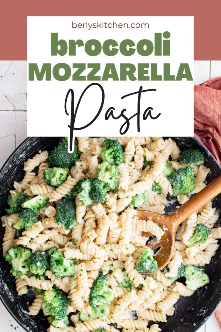 Overhead view of broccoli mozzarella with a wooden spoon.