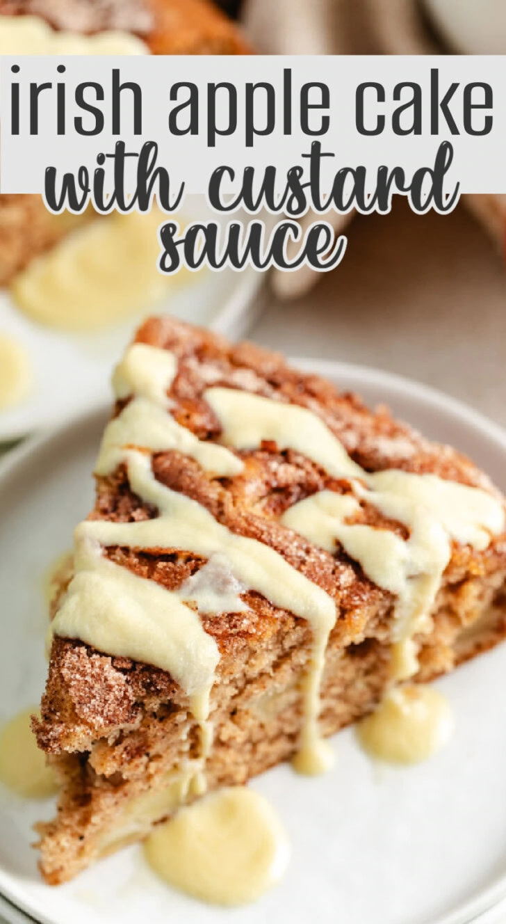 A slice of Irish apple cake topped with custard sauce.