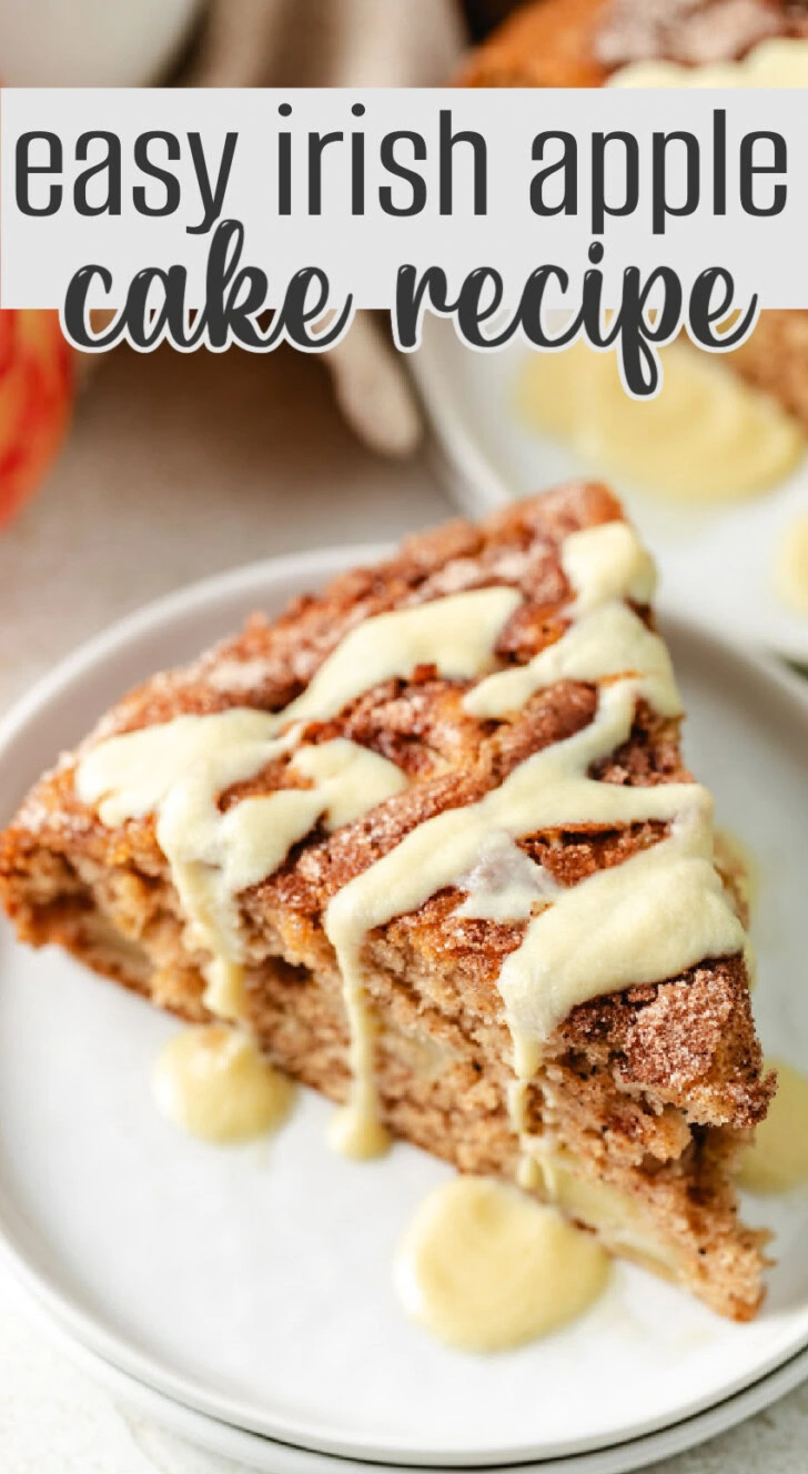 A slice of Irish apple cake drizzled with custard on a small white plate, with the text easy Irish apple cake recipe overlaid at the top.